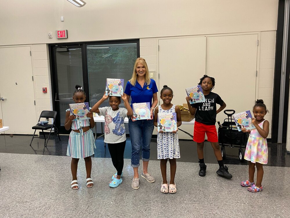 Lisa Spencer and Children attending her book reading.