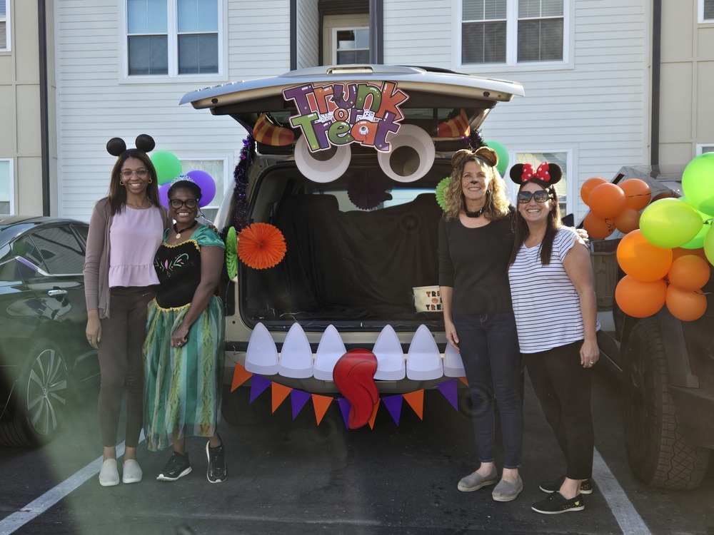 FHA Staff and decorated vehicle