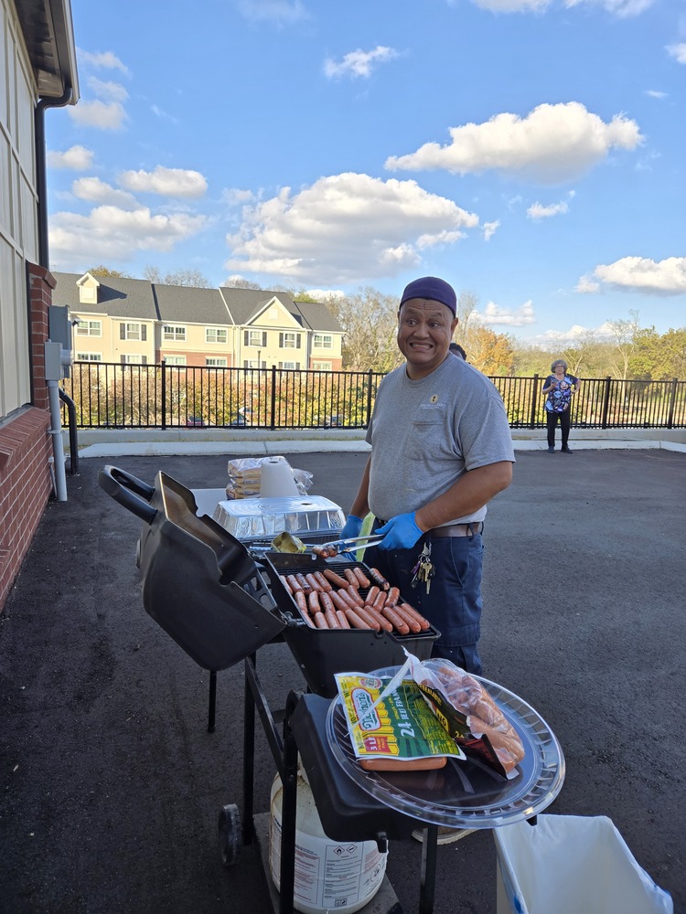 Chef Dan cooking hotdogs