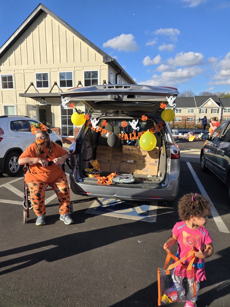 Halloween decorated vehicle and residents